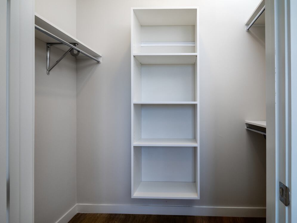 Walk-in closet with built-in shelving