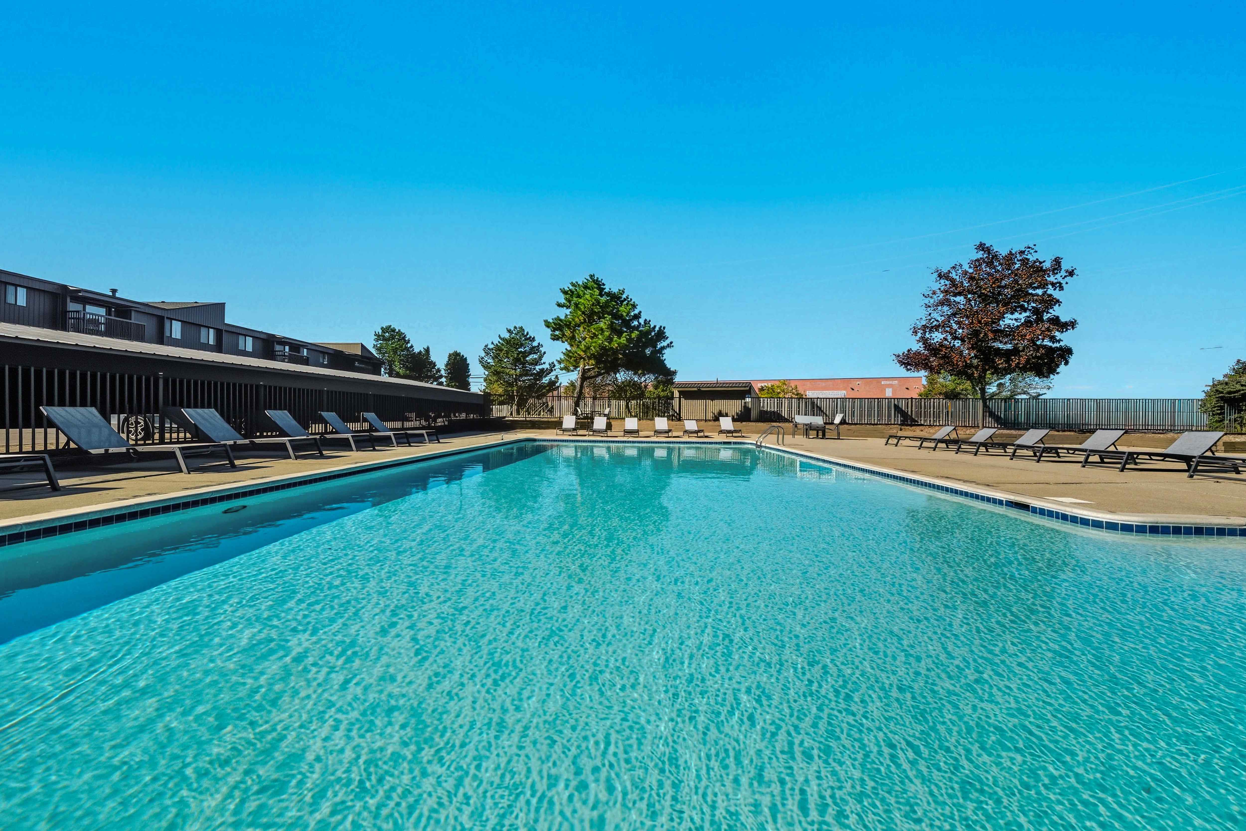 Sparkling Swimming Pool and Sun Deck at Franklin River Apartments in Southfield, MI