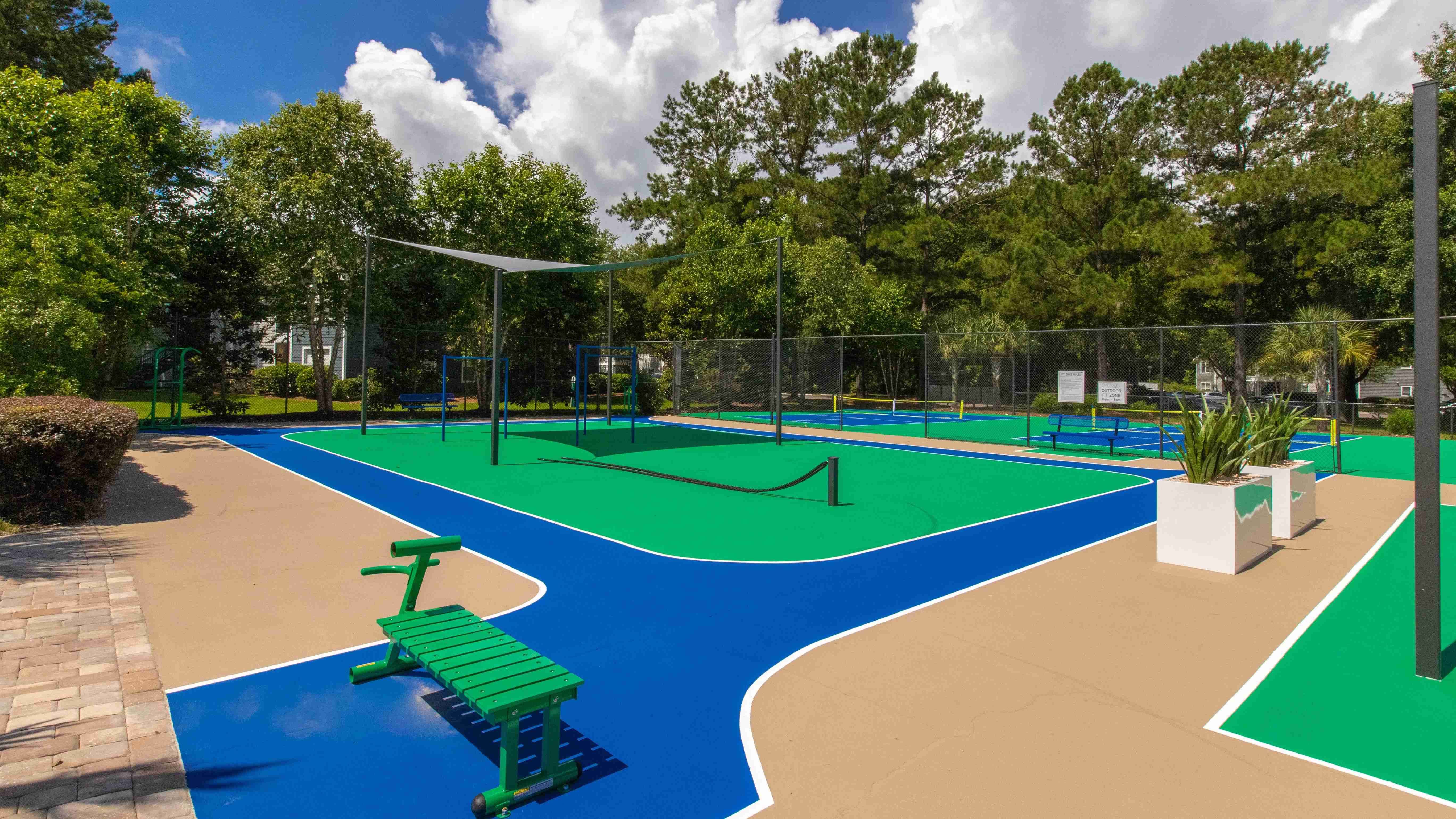 The Outdoor Fitzone invites residents to stay active amid the beauty of nature, offering a tranquil courtyard equipped with state-of-the-art exercise gear.