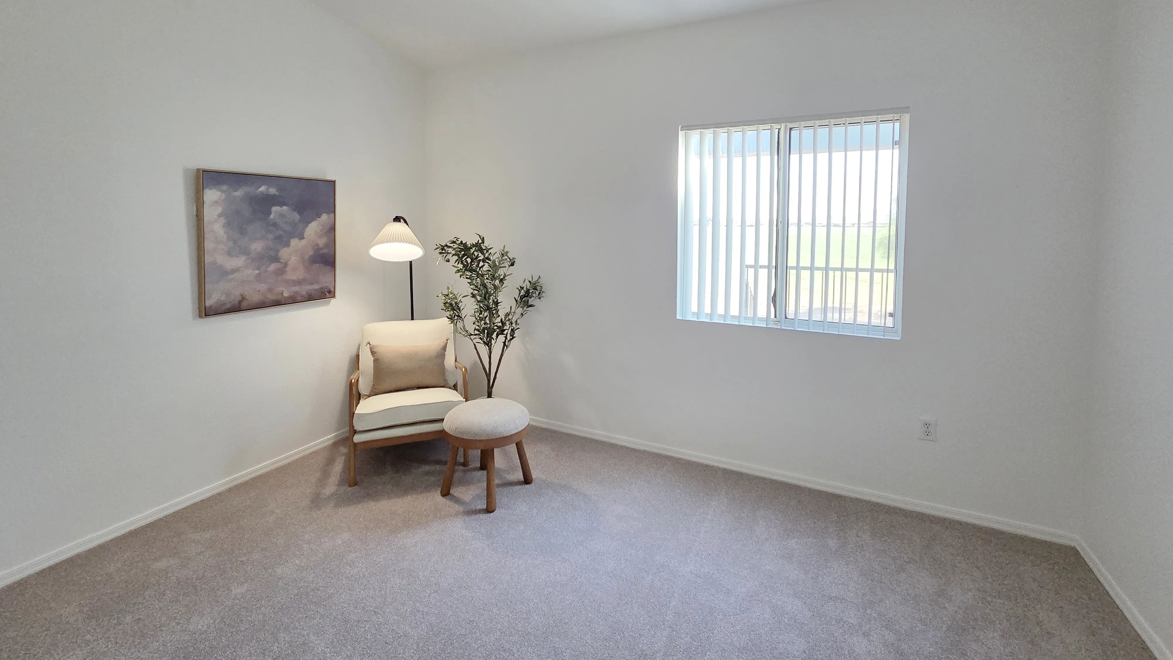 Unwind in a bright, oversized bedroom featuring plush carpeting, a generous closet, and plenty of room for a king-sized bed and additional furniture.