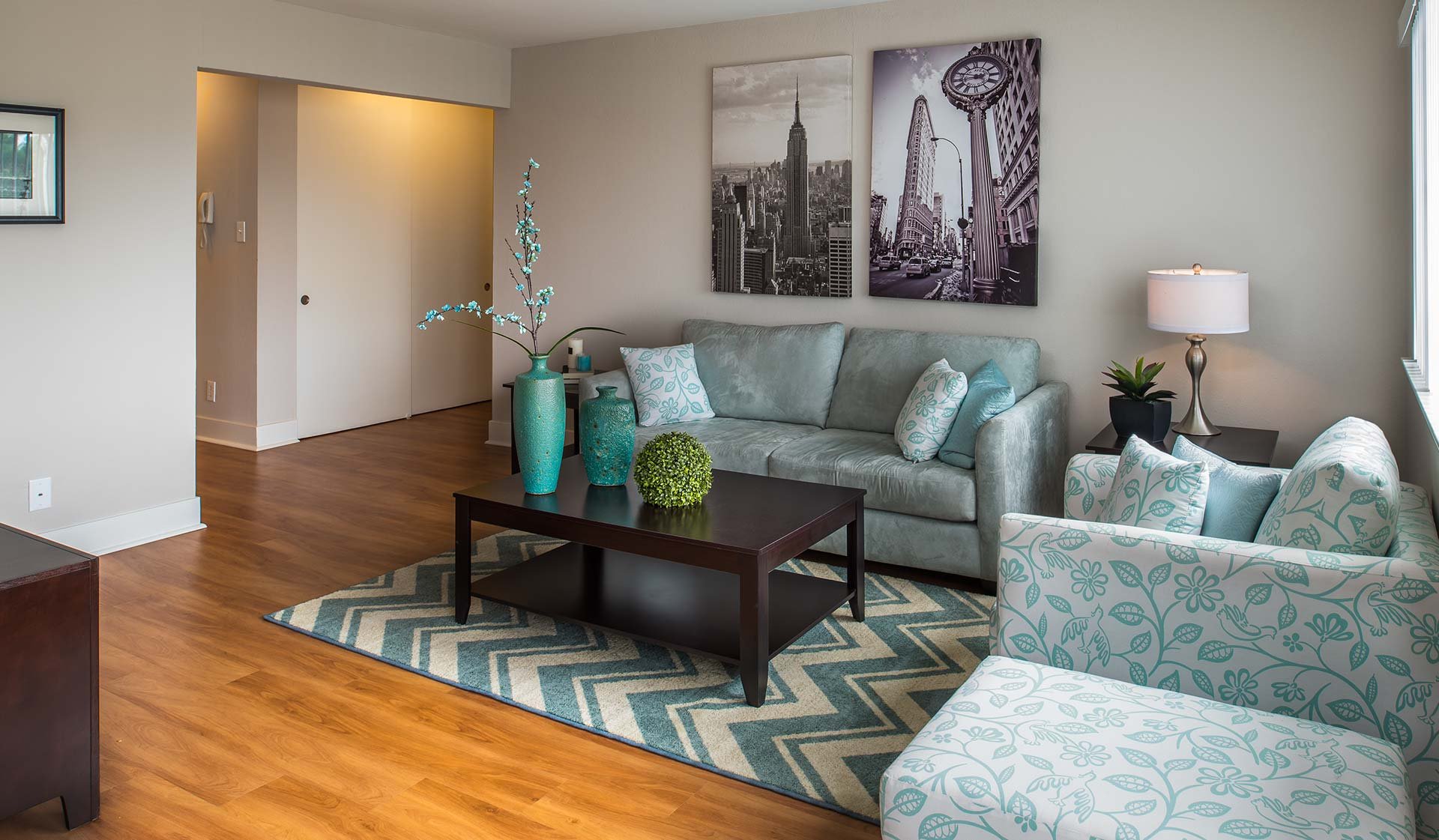 Spacious living room with wood flooring throughout