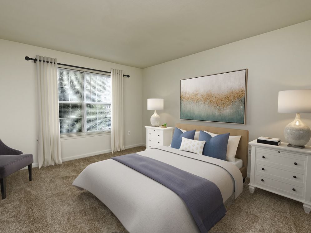 Bedroom with carpeted flooring