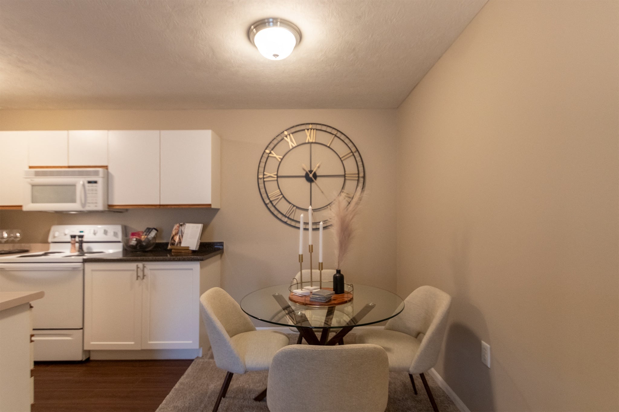Our model Liberty kitchen features both upgraded cabinetry with dark countertops and classic cabinetry with light countertops.