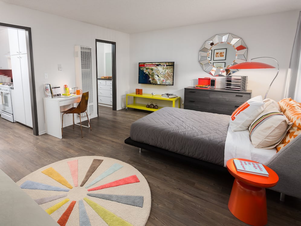 Classic Package II kitchen and living area with hard surface flooring (select homes)