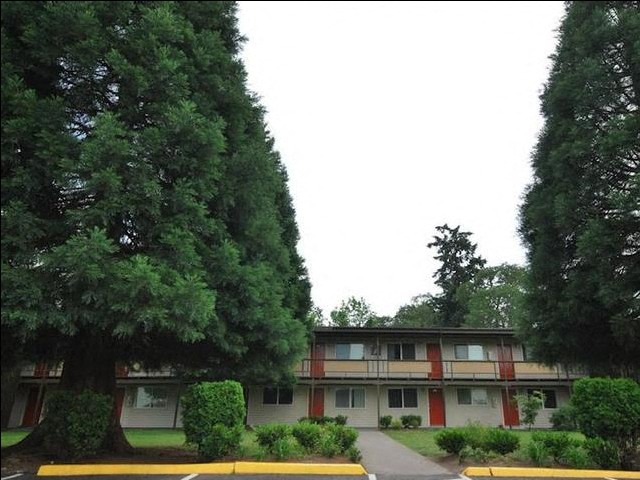 Wisteria Walk Apartments Building Exterior and Trees
