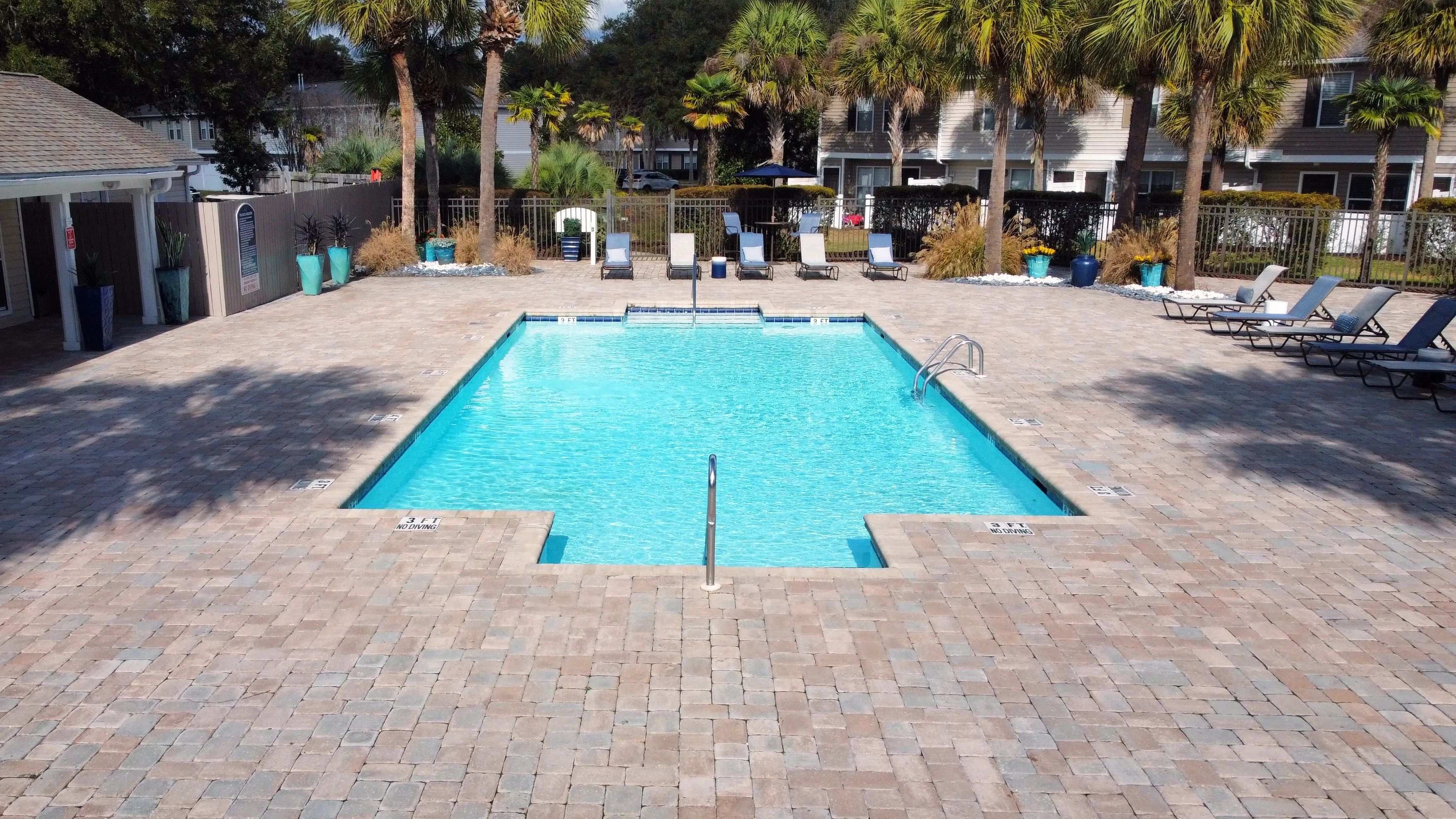 Jump into our sparkling swimming pool, a perpetual sanctuary of sunshine. 