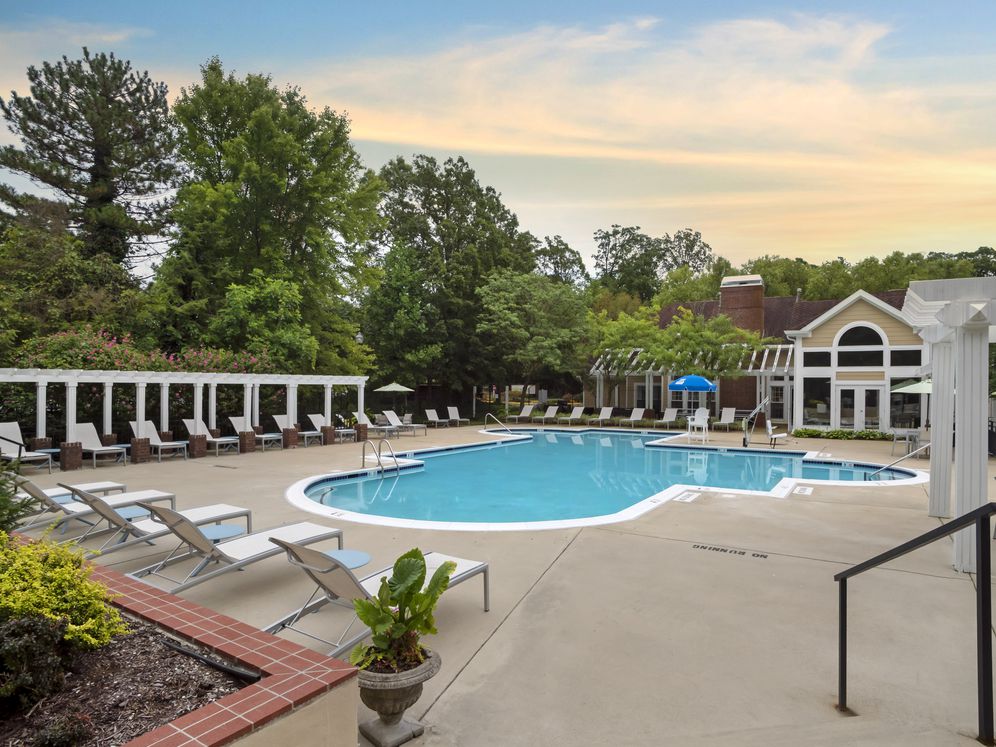 Swimming pool and sundeck with lounge seating