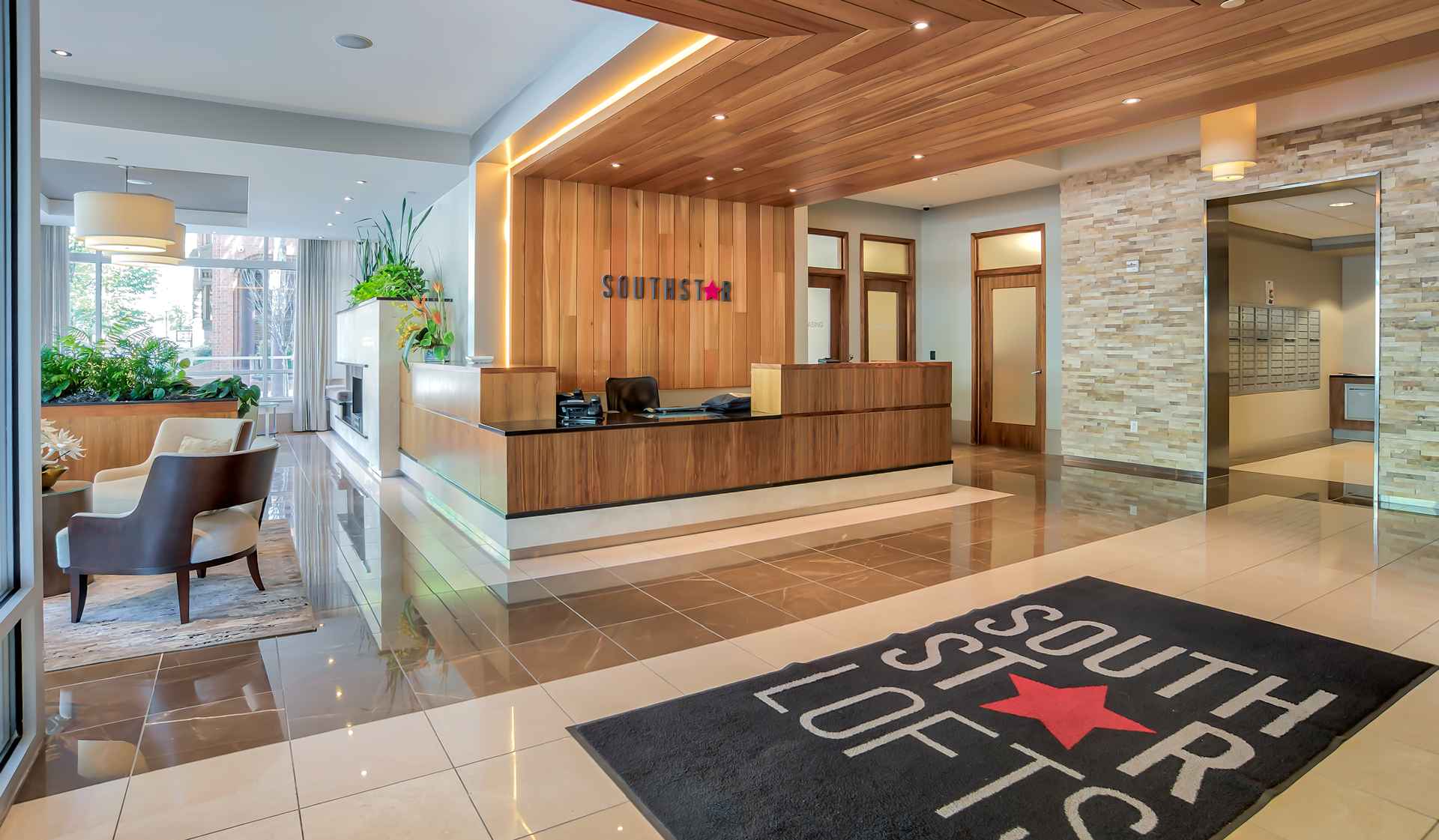 Modern lobby with lounge seating and fireplace