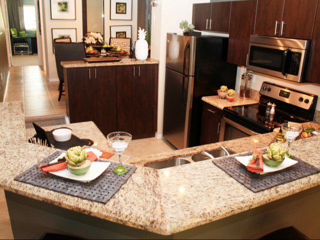 Oversized Breakfast Bar with Dry-Bar as storage.