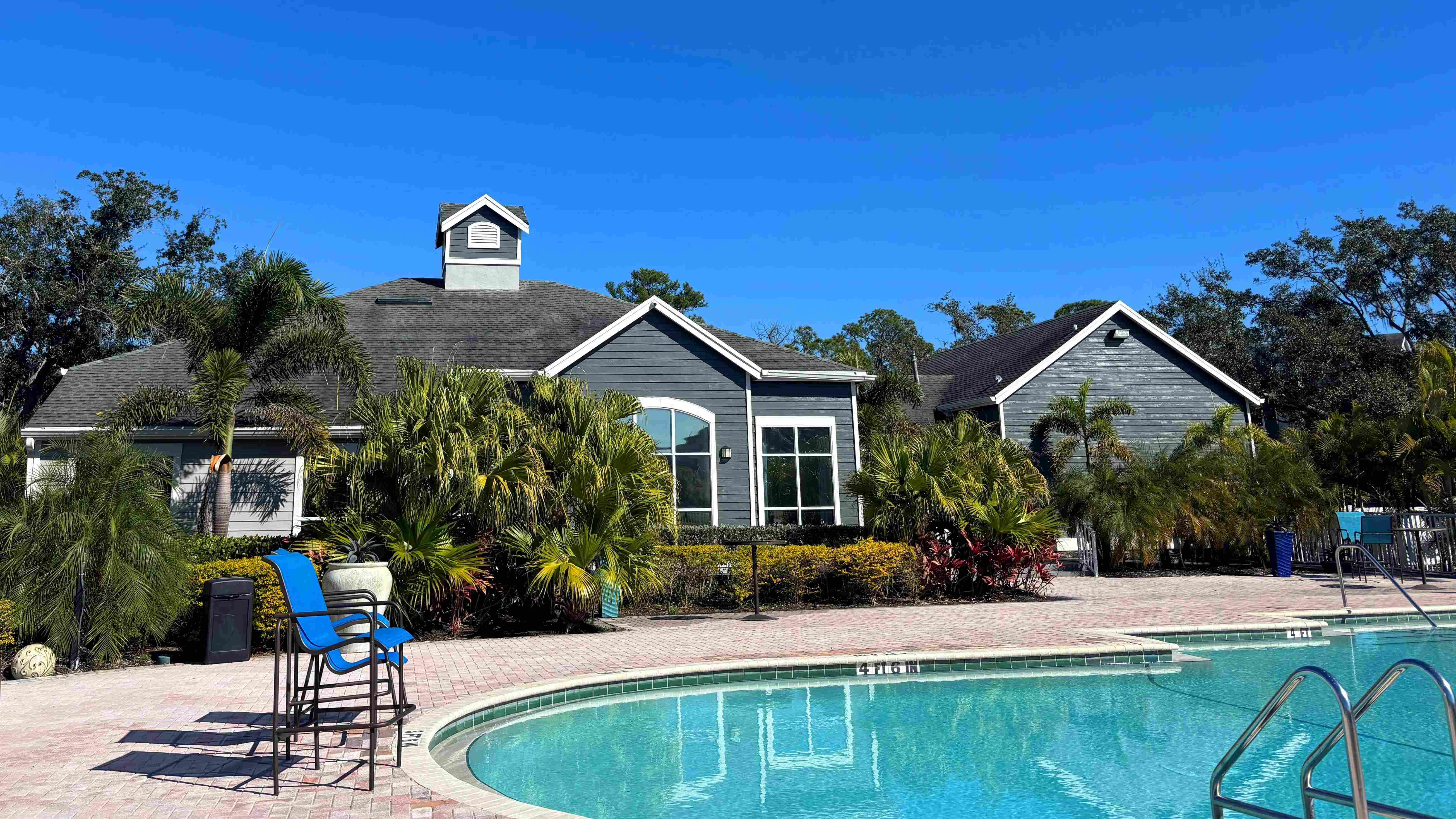 Soak up the Florida sunshine beside our sparkling resort-style pool, framed by lush palm trees and our newly painted clubhouse at Eden Pointe in Bradenton.