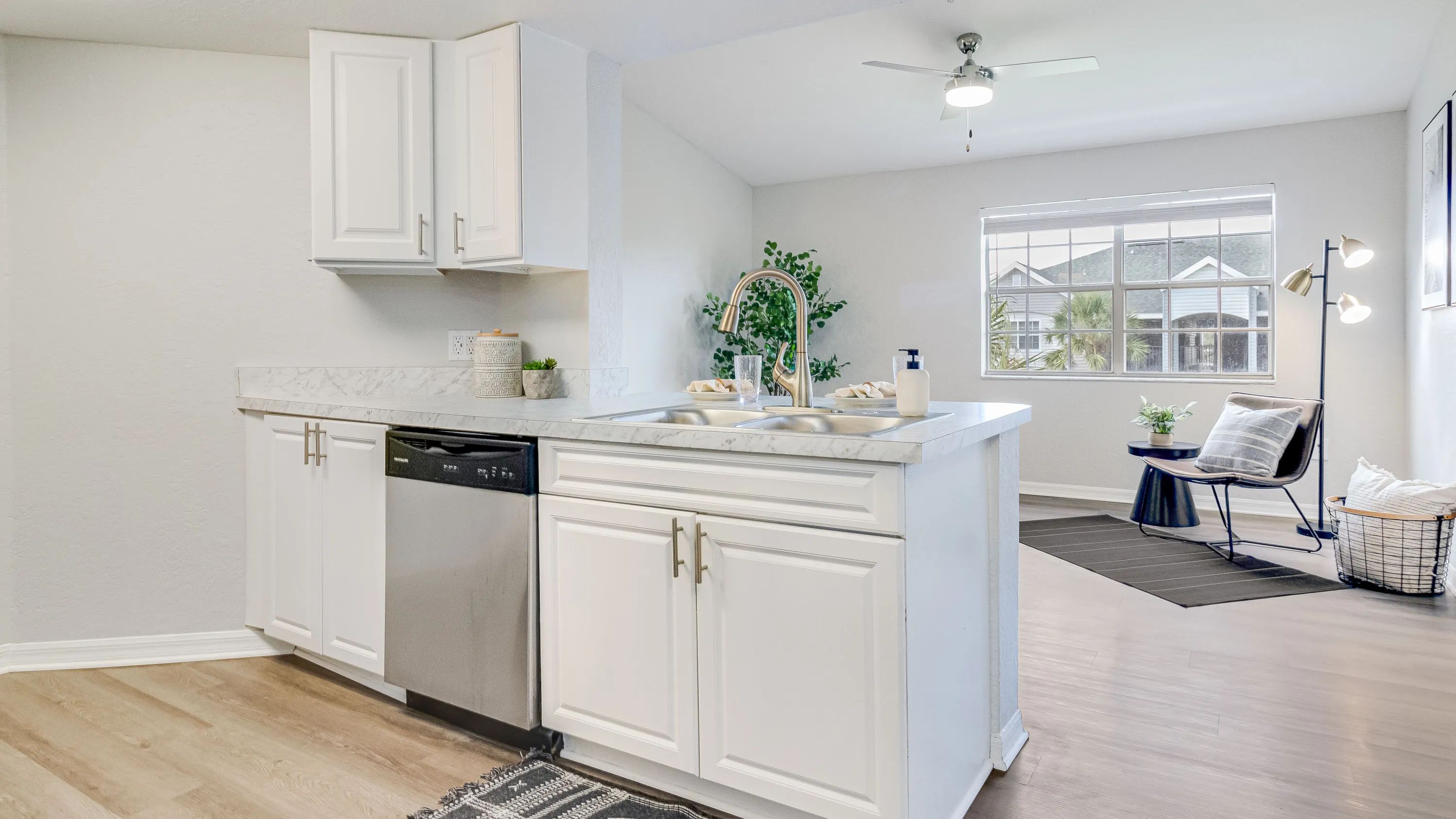 Delight in the beautiful open kitchen design with a breakfast bar, fostering a harmonious connection between culinary artistry and relaxed living.