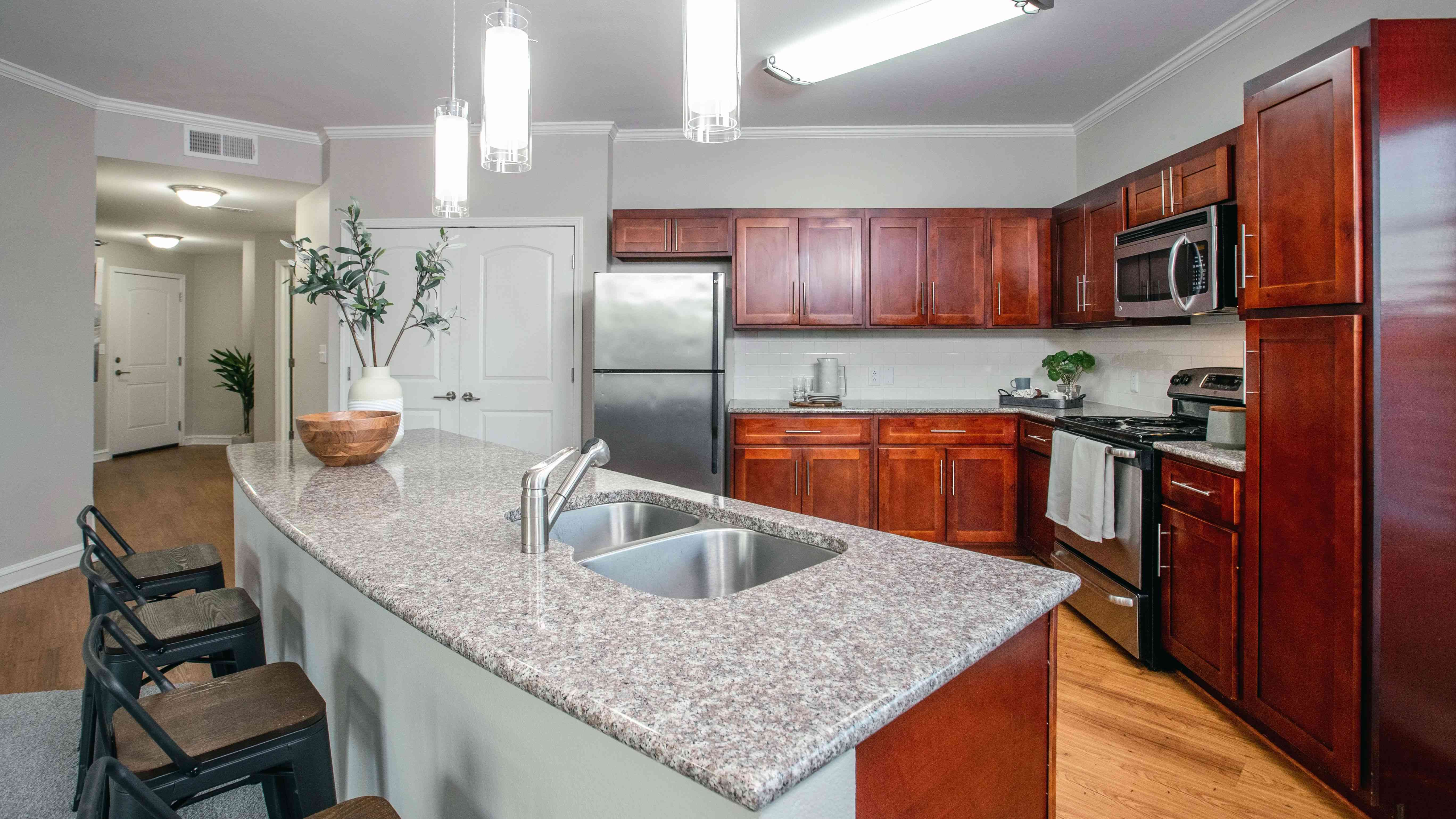 Indulge in modern kitchens with stainless-steel appliances, magnificent cabinetry, and upscale finishes, reflecting a commitment to quality living.