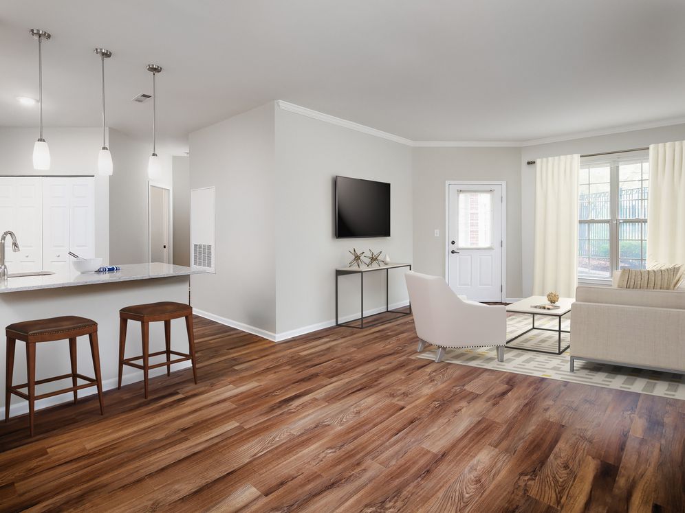 Classic Finish kitchen, dining, and living areas with hard surface flooring