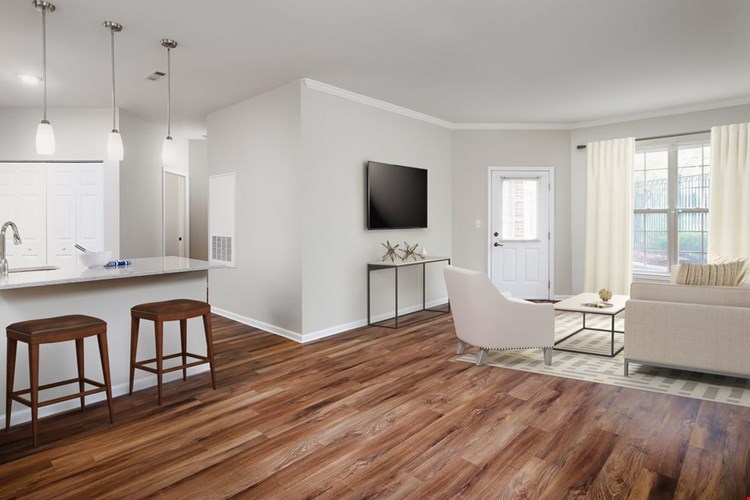 Classic Finish kitchen, dining, and living areas with hard surface flooring