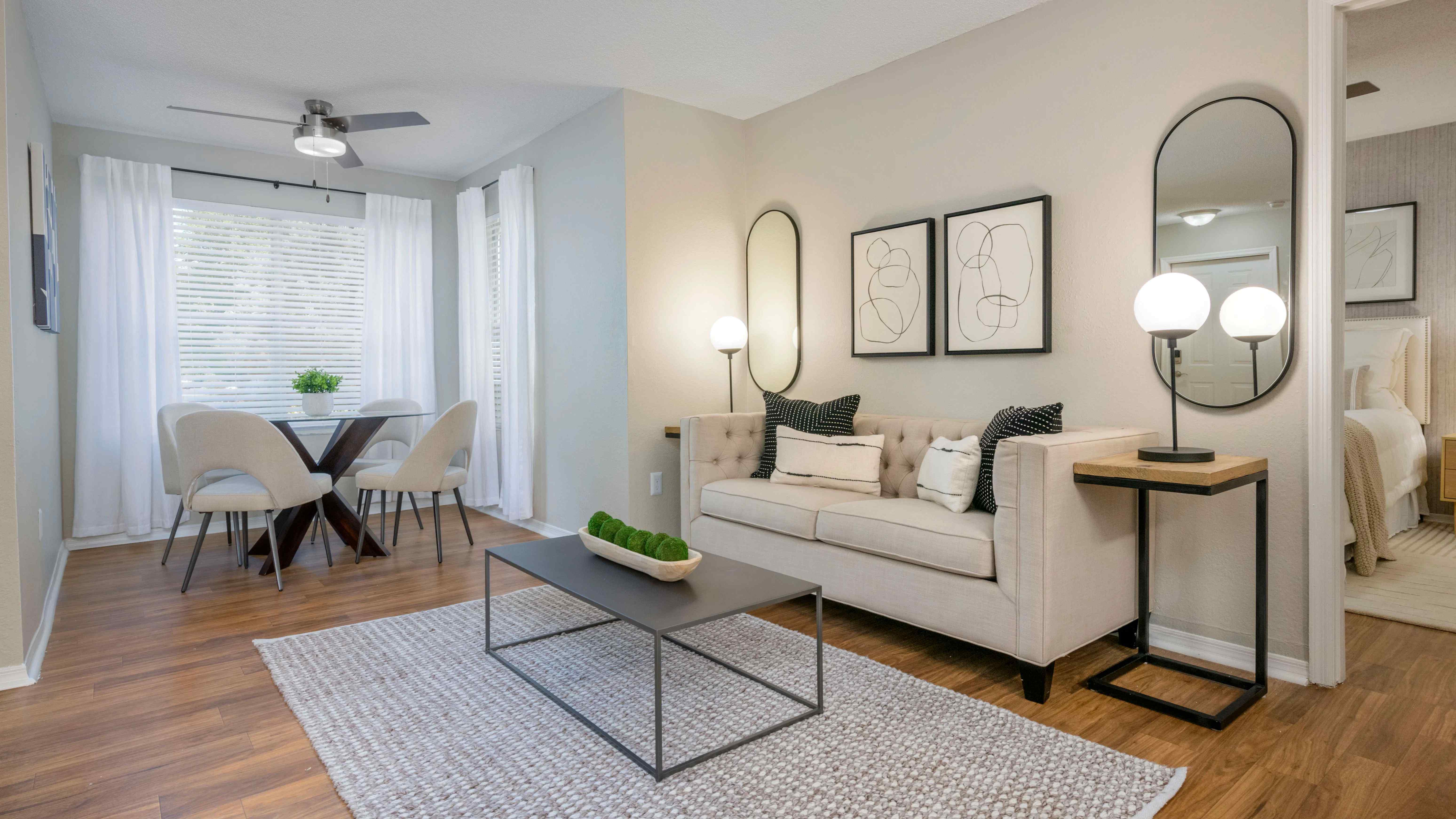 Bright and airy living room with a versatile bonus space, inviting you to create a cozy oasis for your hobbies, passions, or relaxation.