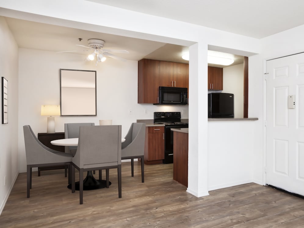 Classic Package dining area and kitchen with hard surface flooring