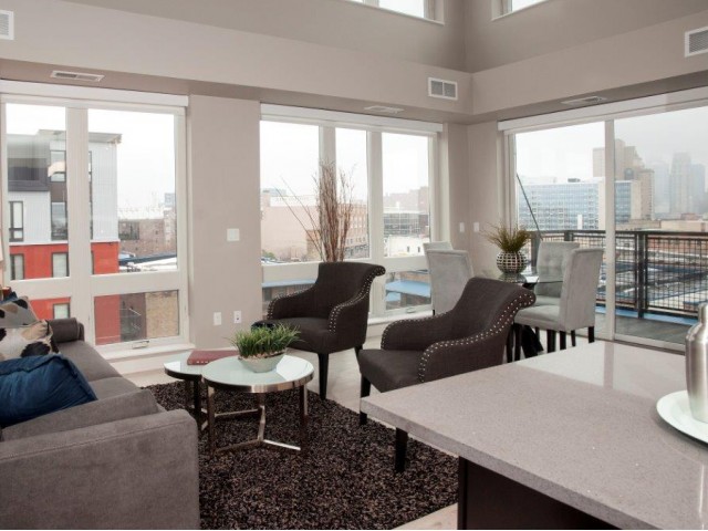 Living Room with Over-sized Windows (Great skyline view!)