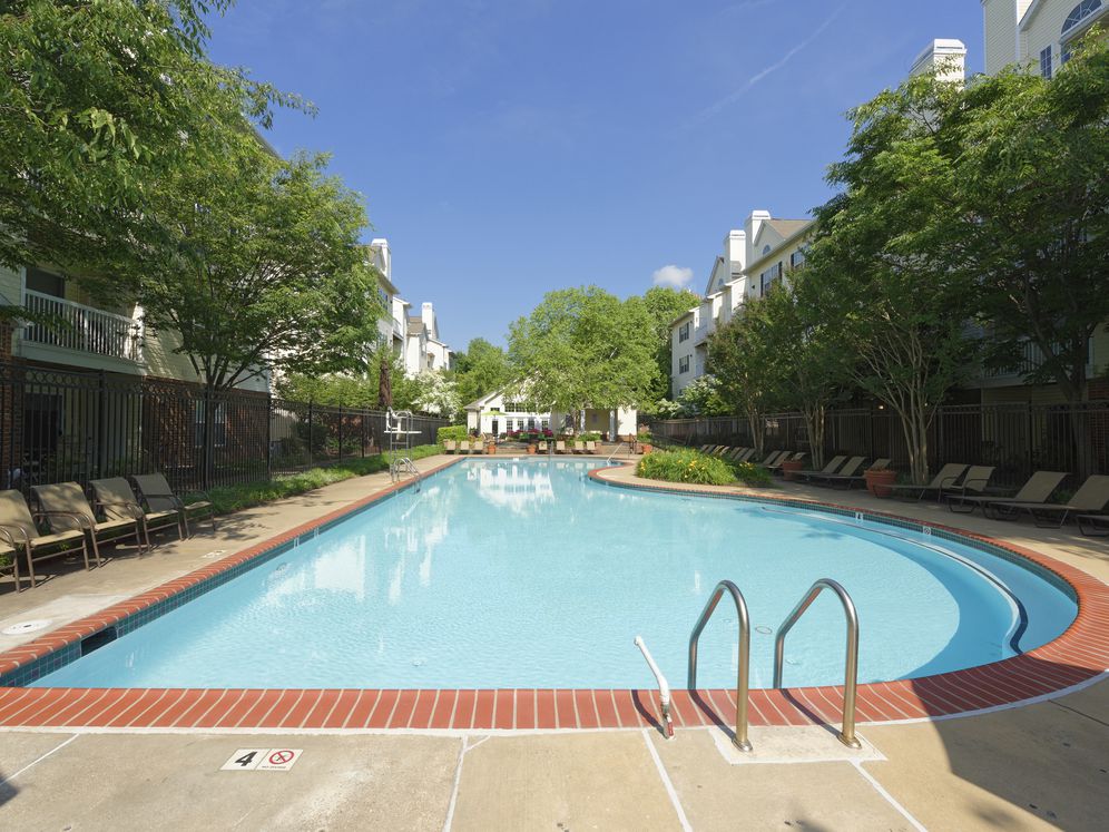 Swimming pool with sundeck and lounge seating