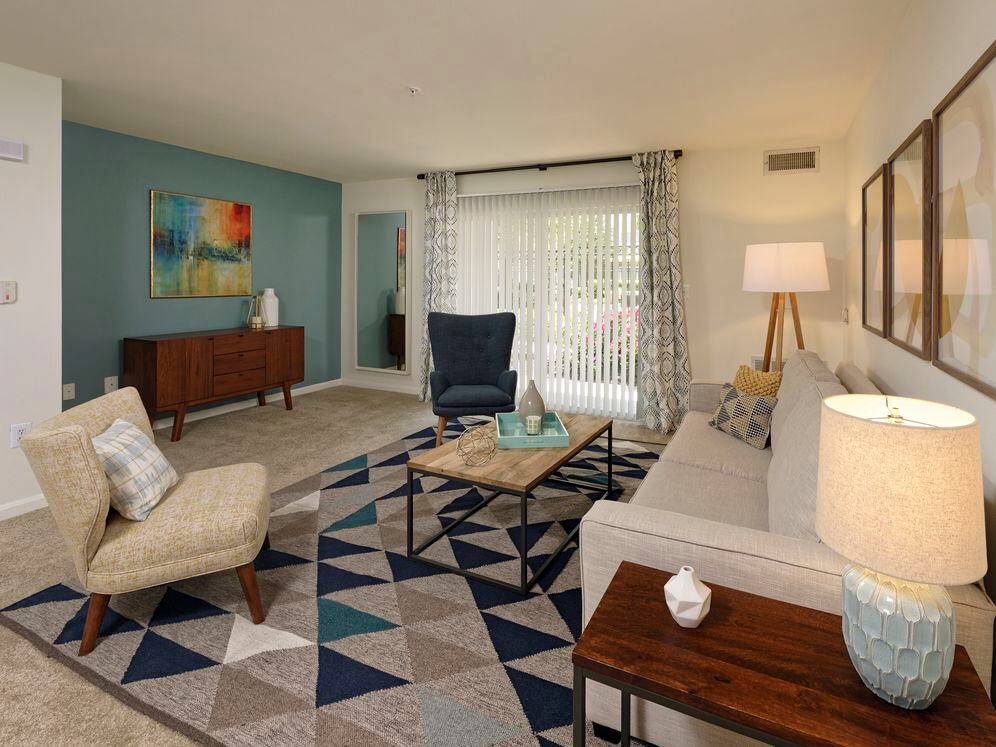 Classic Package I living room with carpeted flooring