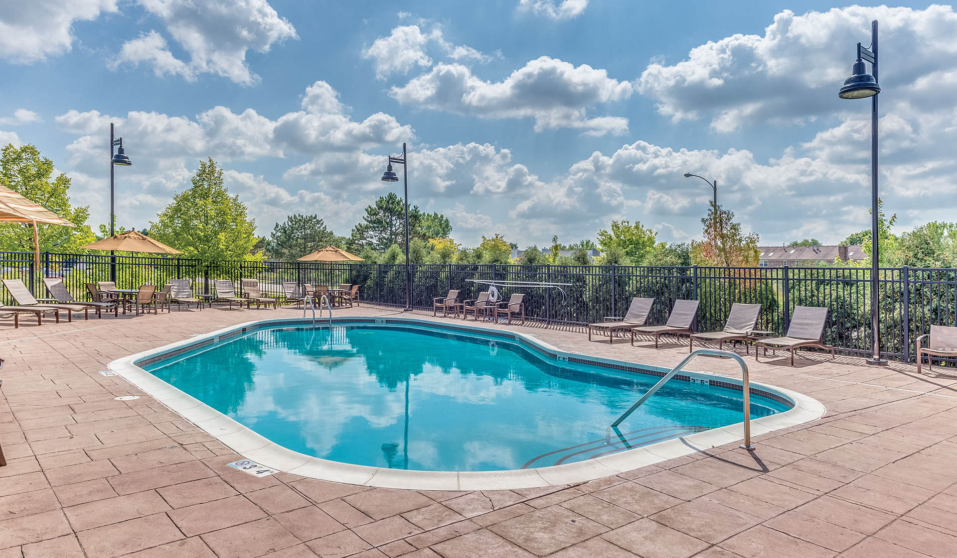 Beautiful heated pool with expansive sundeck
