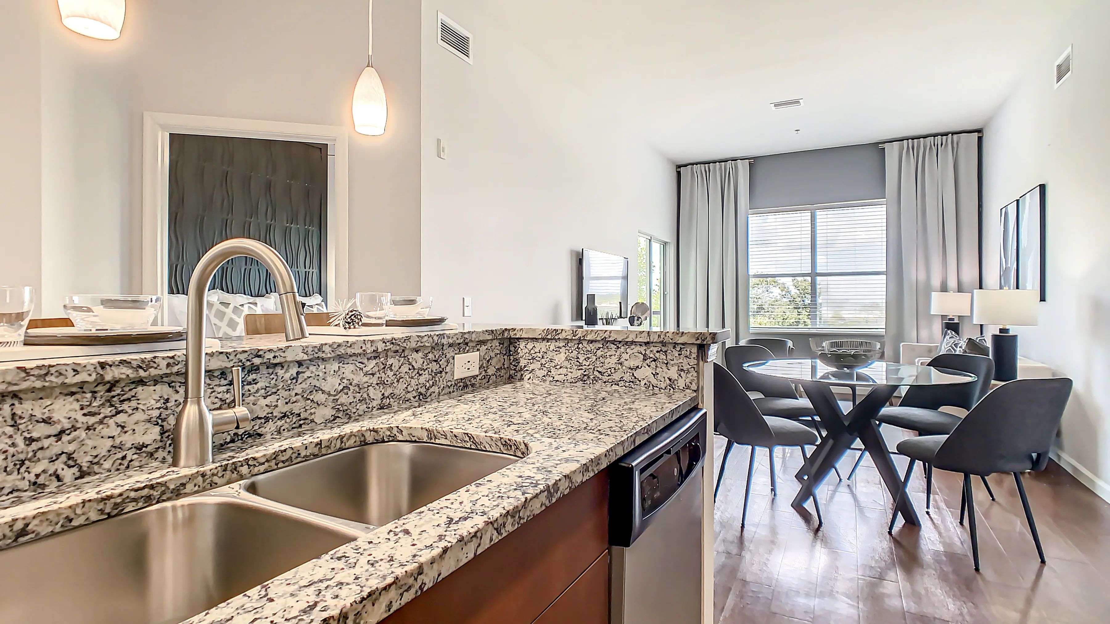 Revel in kitchens adorned with designer granite countertops and gleaming stainless-steel appliances.