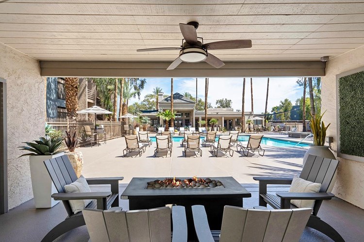 Warm up around our poolside firepit.