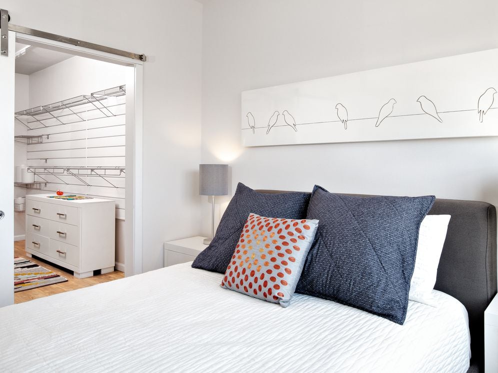 Bedroom with walk-in customizable closets