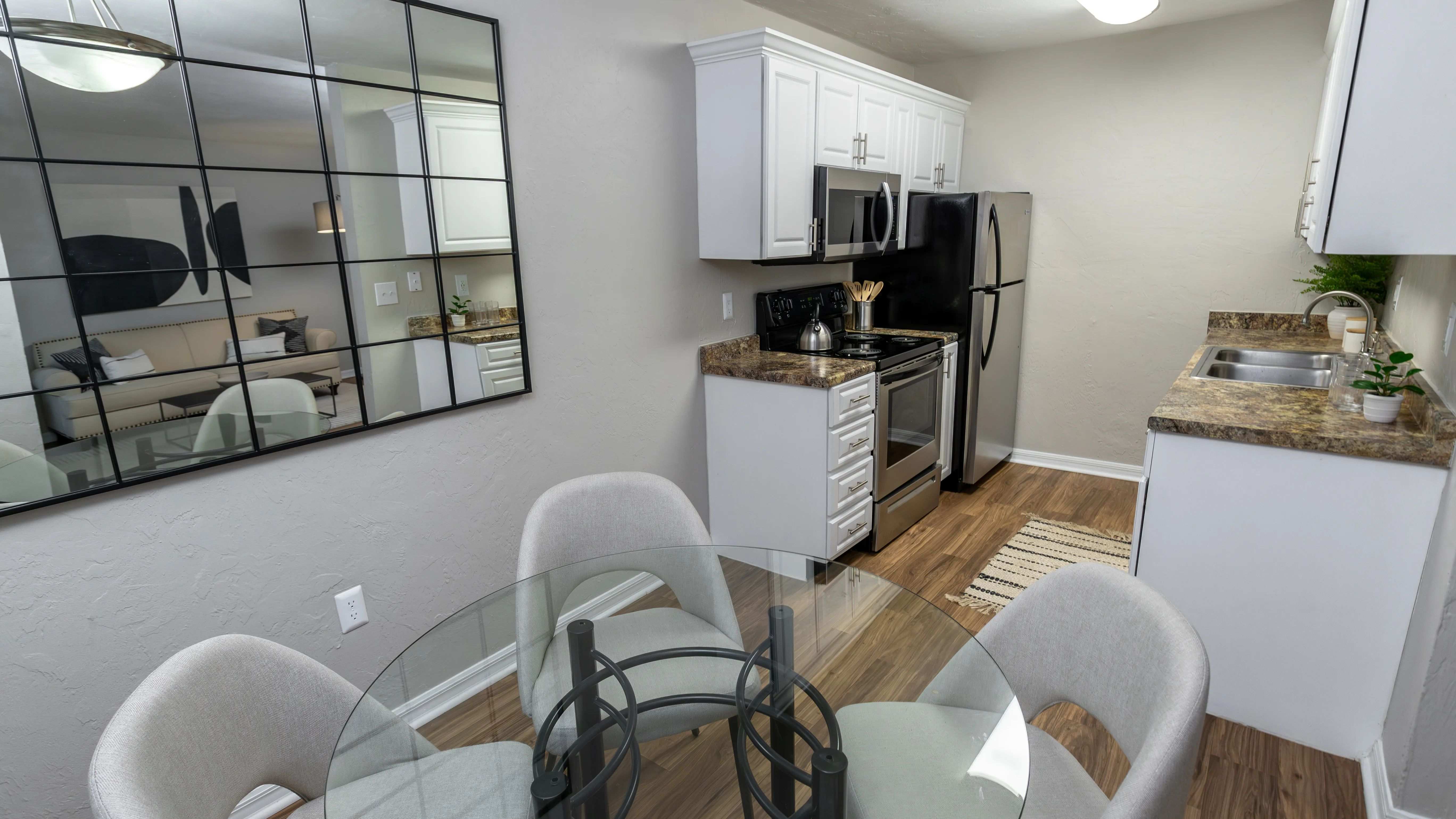 Dine in style in our separate dining area with contemporary lighting, creating an inviting space for delightful family meals. 