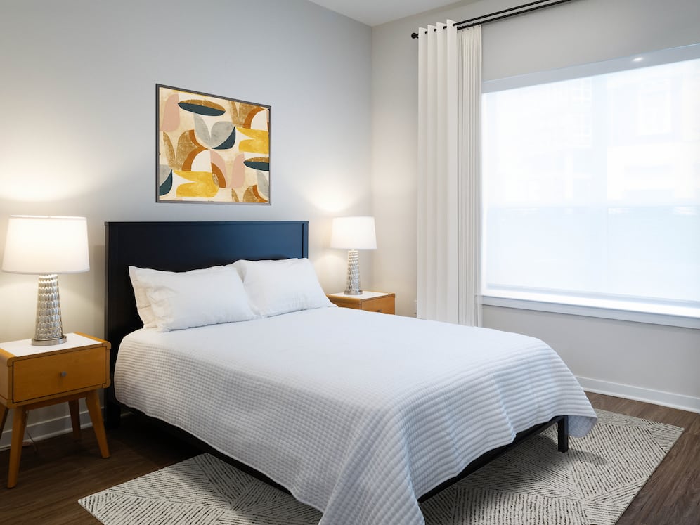 Upgrade Collection Bedroom with hard-surface vinyl plank flooring