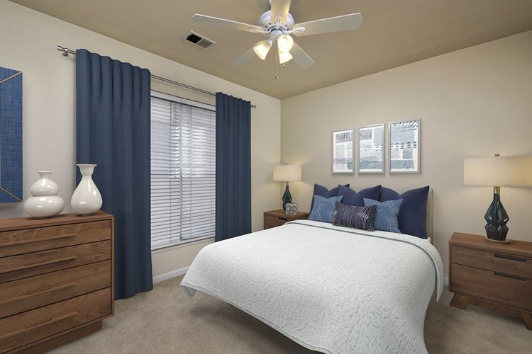 Renovated Package I bedroom with ceiling fan and carpeted flooring