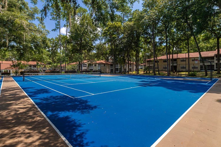 Catch a game on our tennis court.