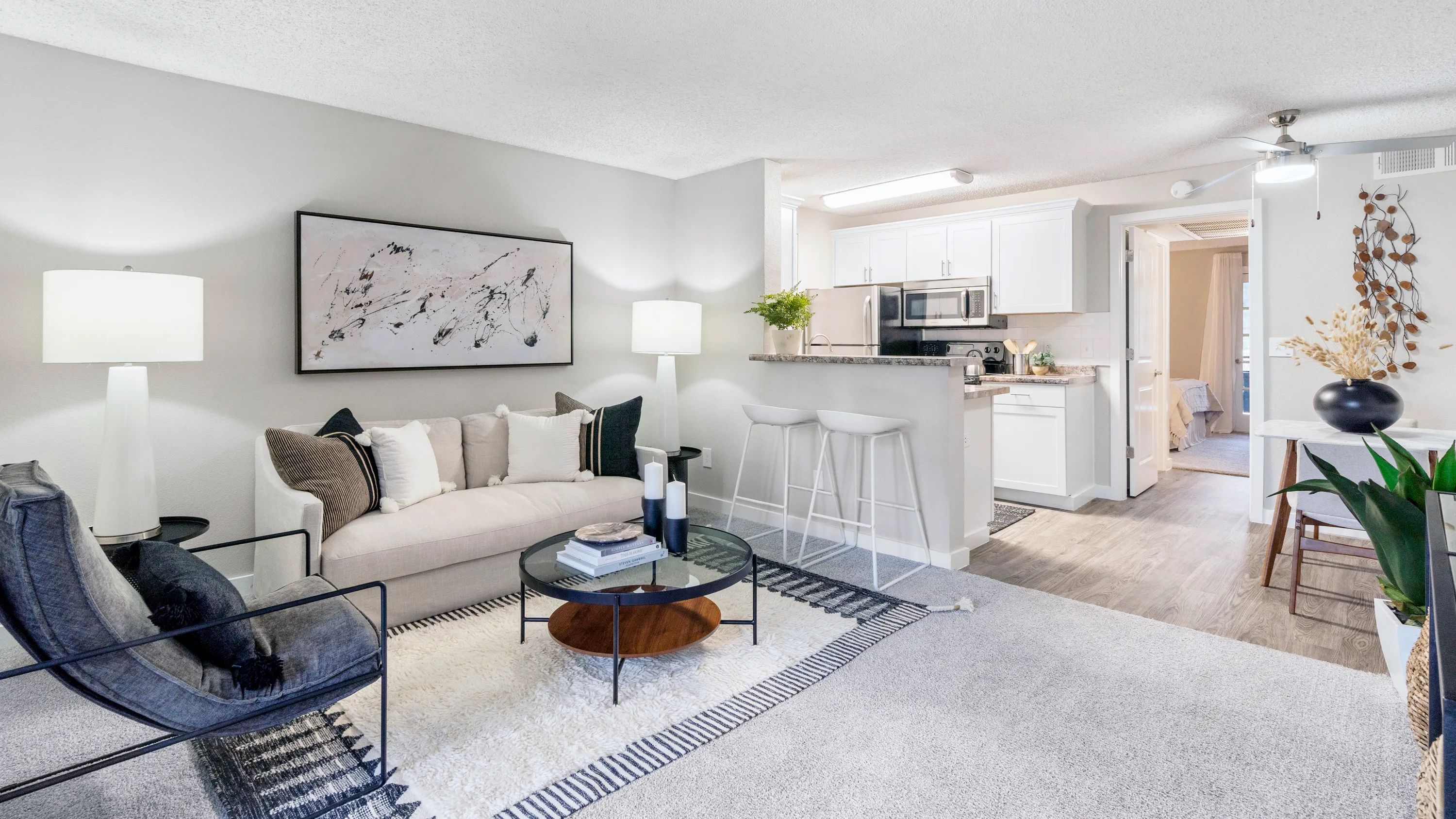 Dance through our open floor plans, where wood-style floors unite your living room and kitchen in perfect harmony. Redefine your style of living!