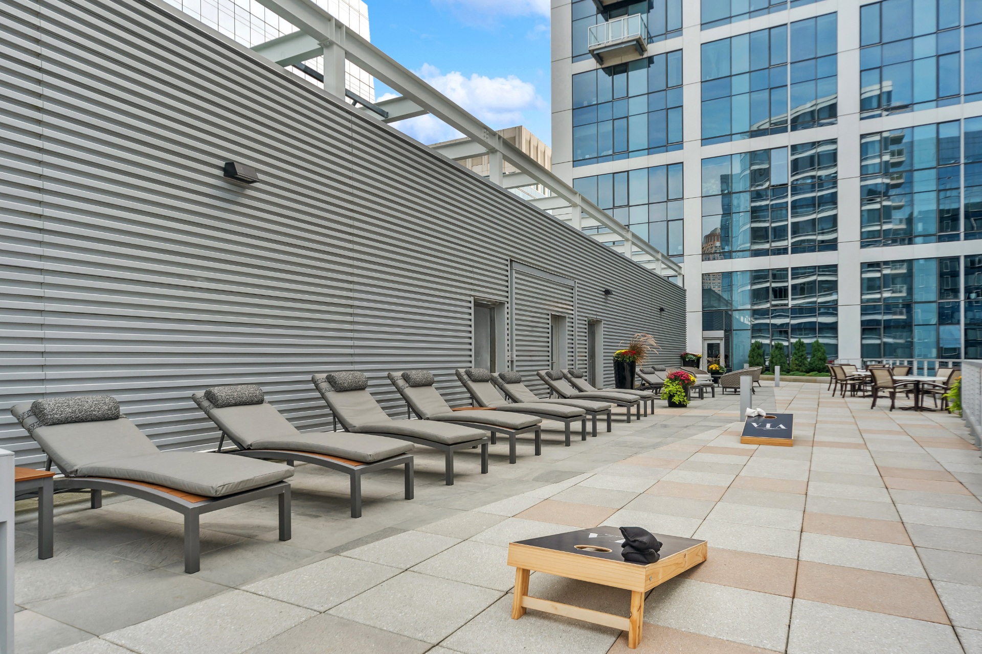 Sun Deck Lounging with Cornhole Games
