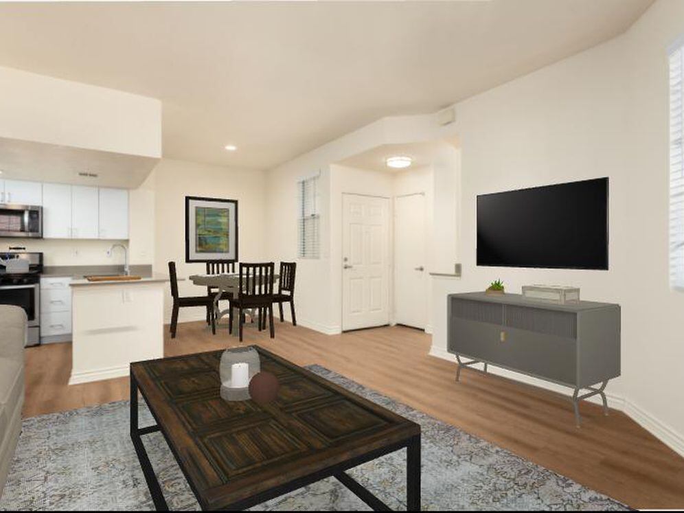 Renovated Package I living area with hard surface flooring