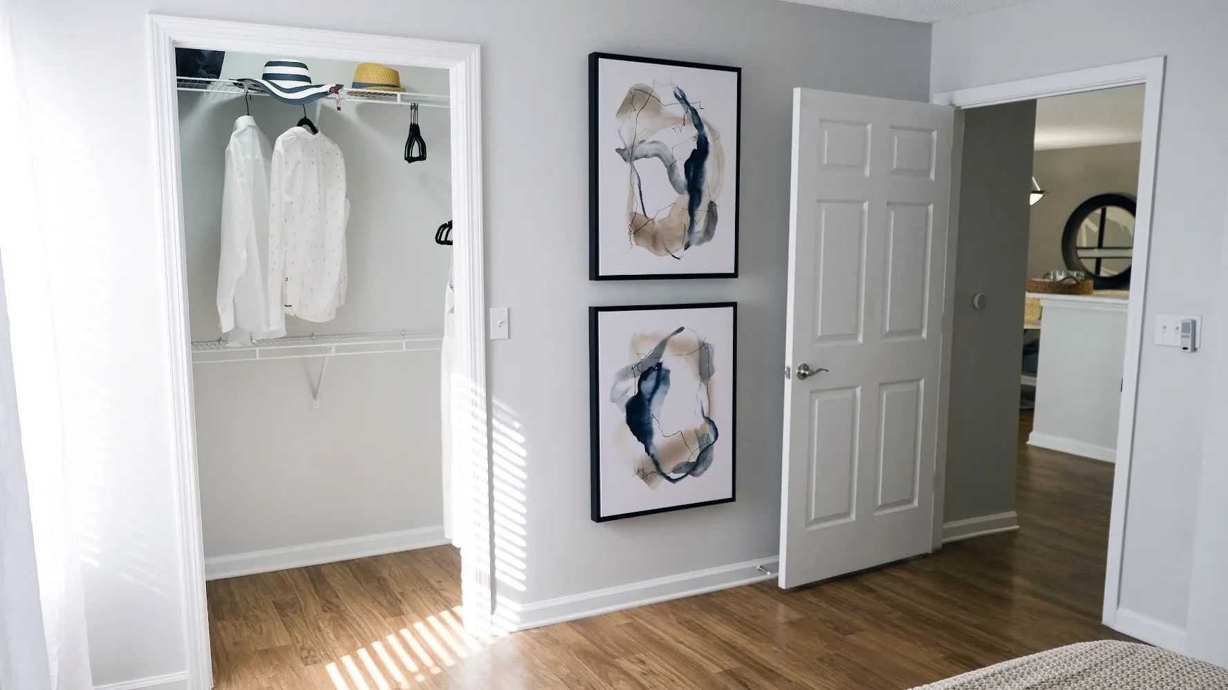 Ample space and thoughtful organization await in your primary bedroom, featuring a walk-in closet.