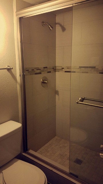 Standup shower with ceramic tile....looks relaxing!