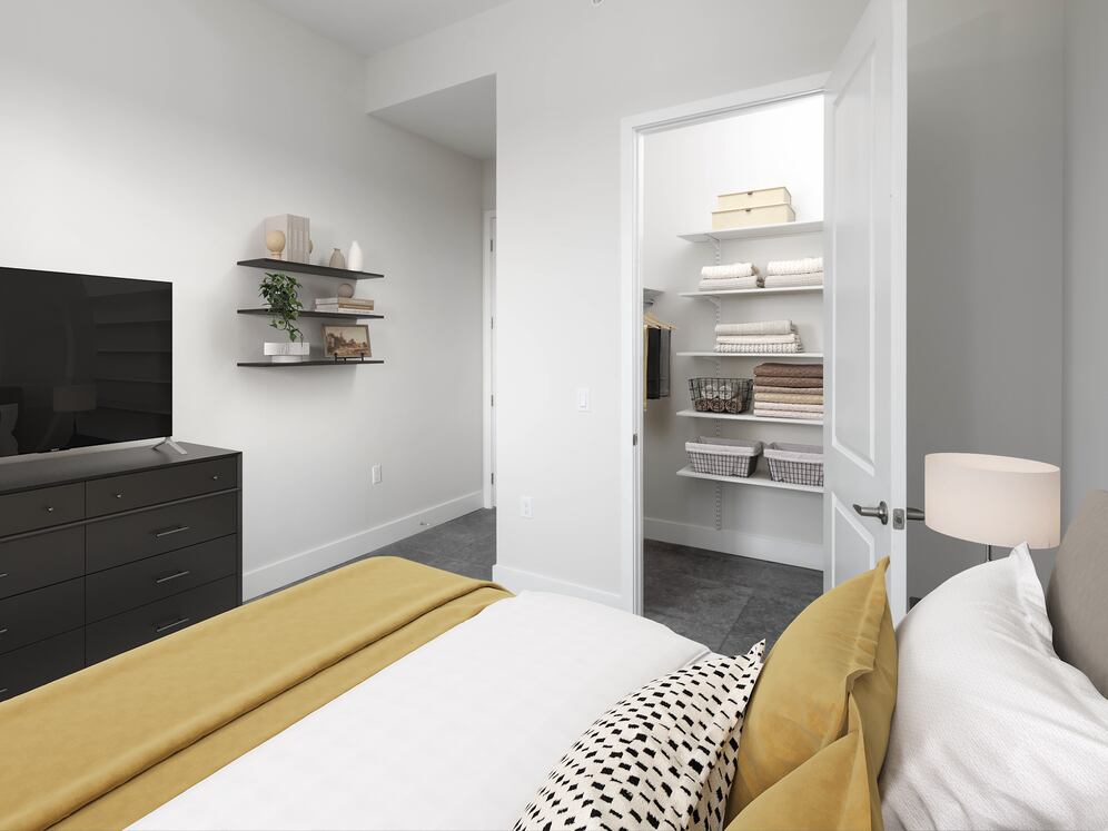 Signature Collection bedroom apartment with custom closet shelving system