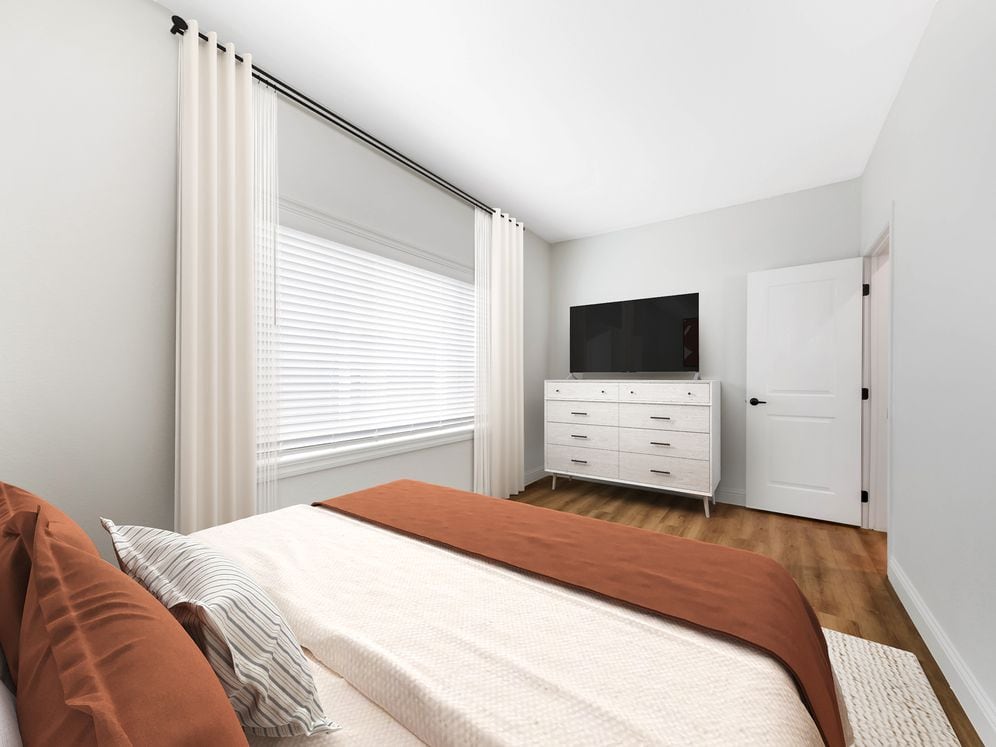 Freestanding Home bedroom with hard surface flooring