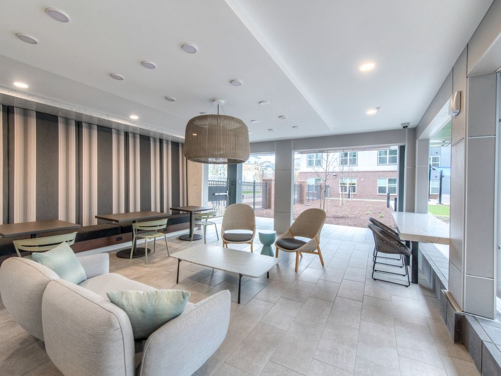 Outdoor lounge with multiple seating areas