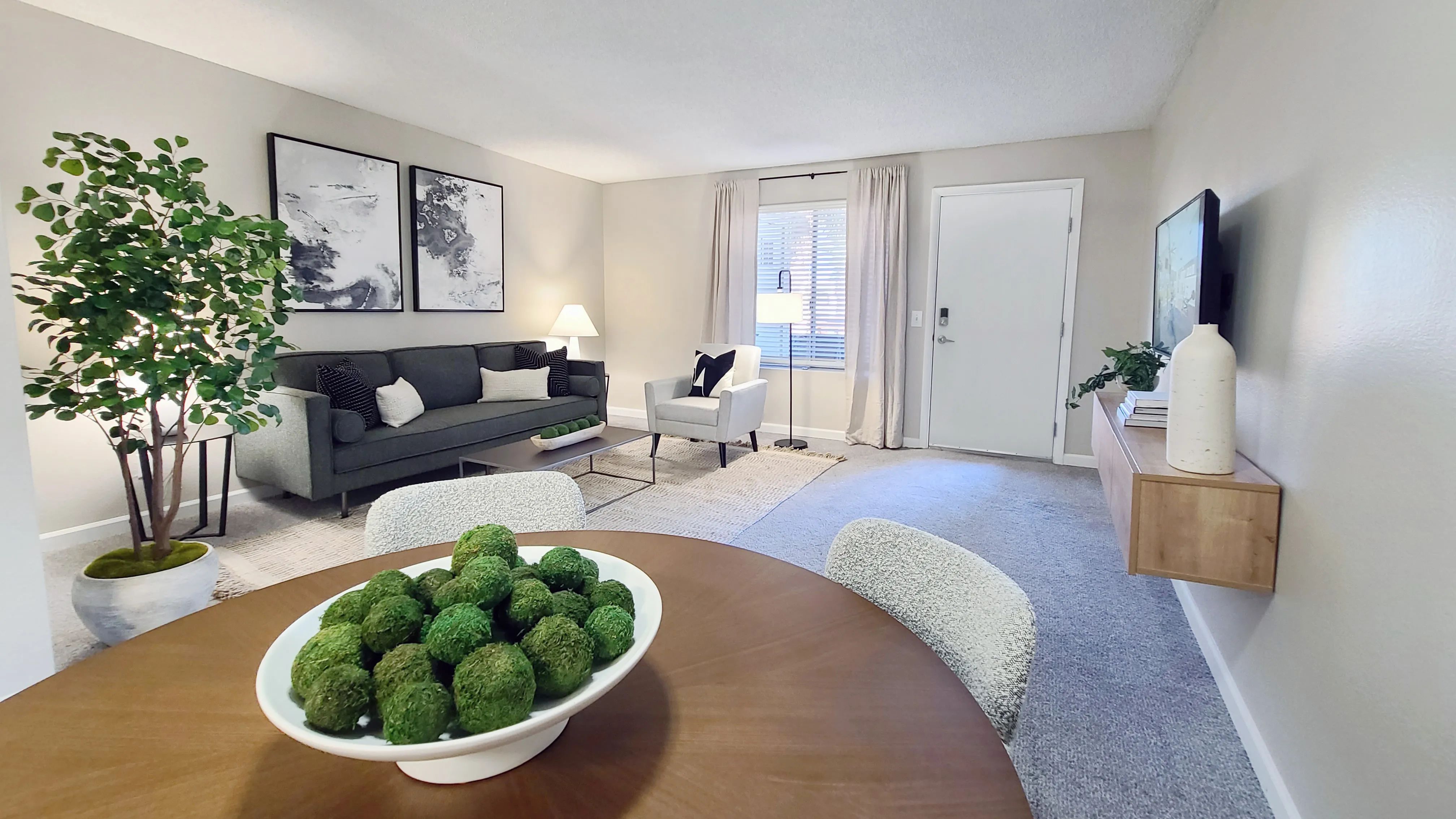 Welcome to your elegant living room, adorned with plush carpets or stylish wood-style flooring, creating the ideal environment for both entertainment and relaxation. 