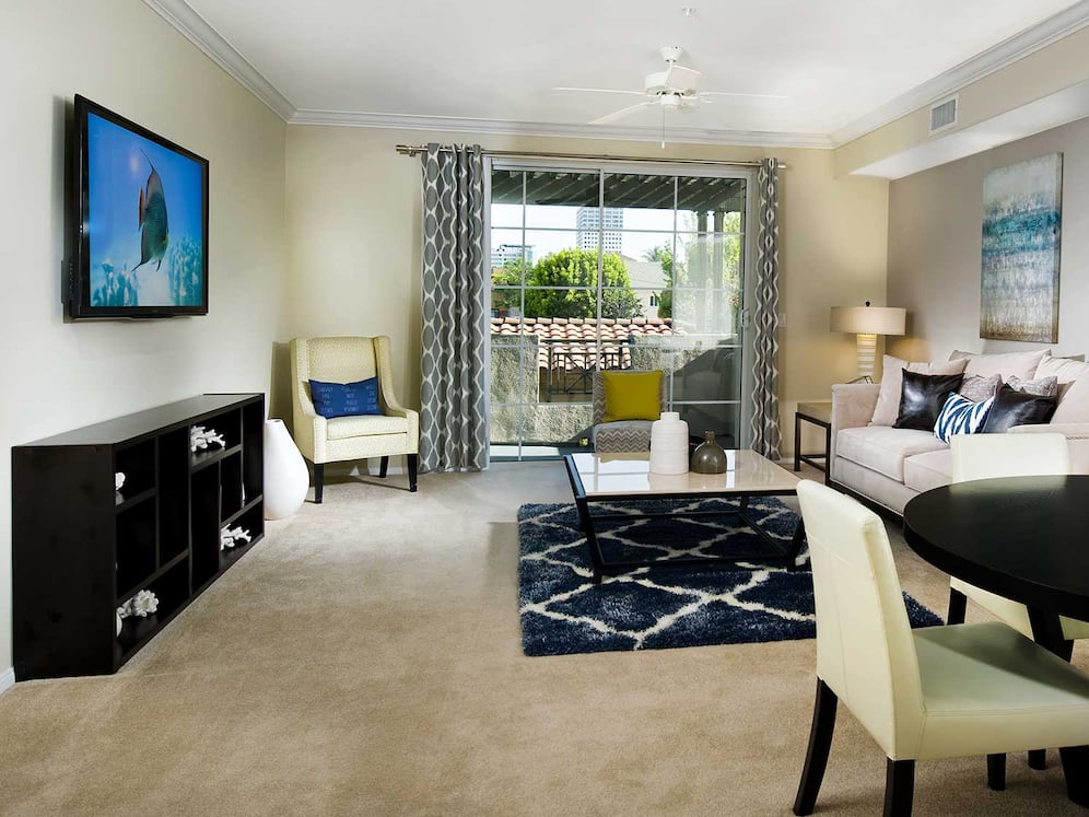 Classic Package I dining and living room with carpet