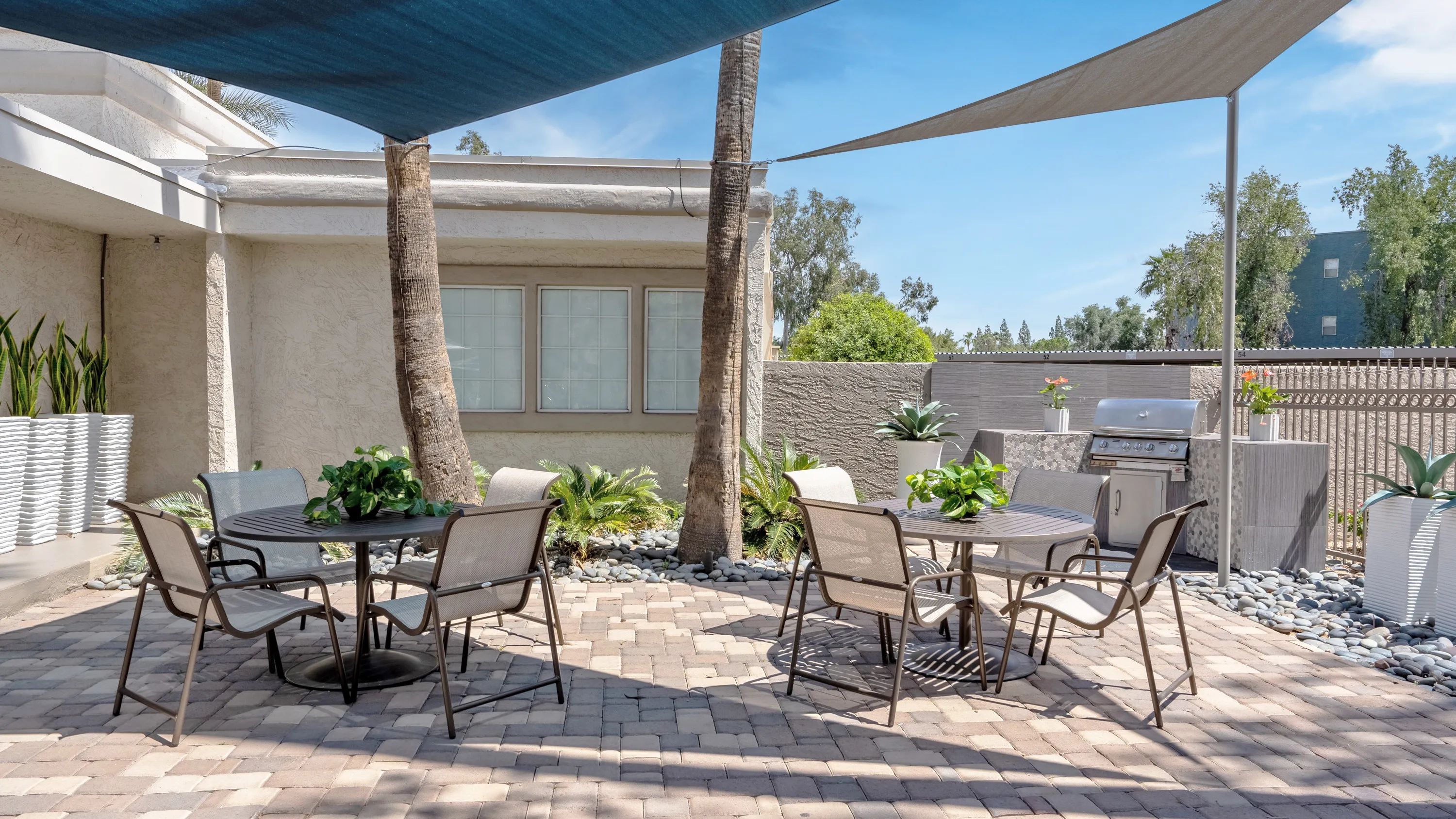Enjoy beautiful Arizona weather year-round in our shaded outdoor gathering space. It's the perfect setting for grilling, relaxing, and spending time with family and friends!