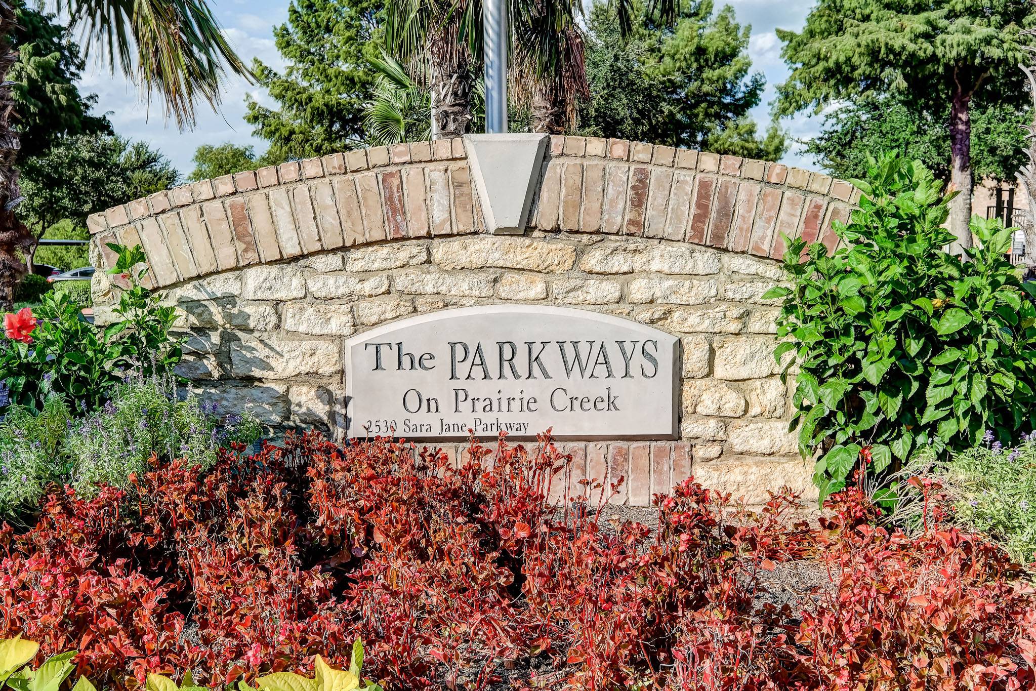 Parkways on Prairie Creek is surrounded by lush landscaping