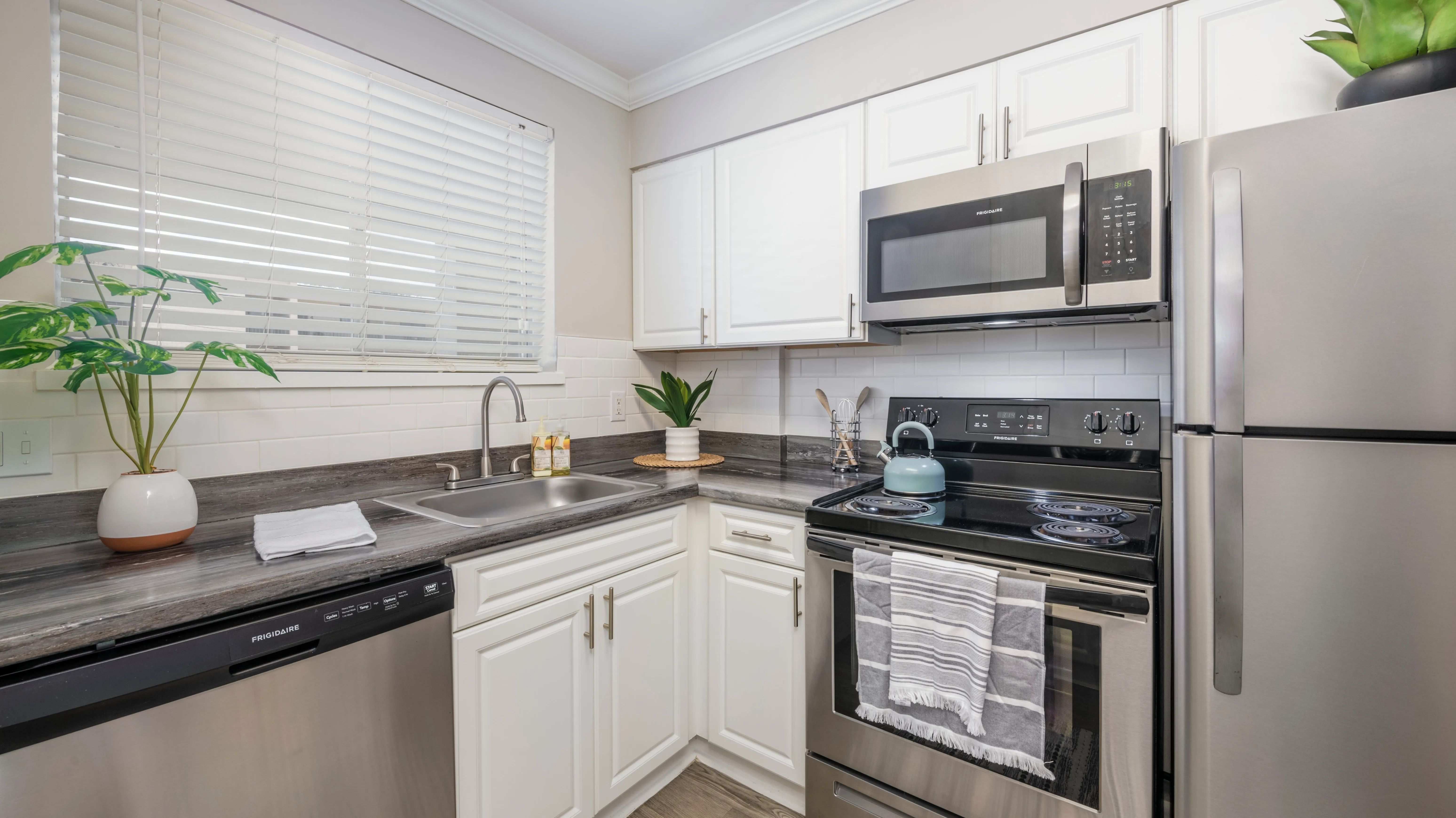 Indulge in culinary enchantment with our kitchens, adorned with top-of-the-line stainless-steel appliances and exquisite finishes. 