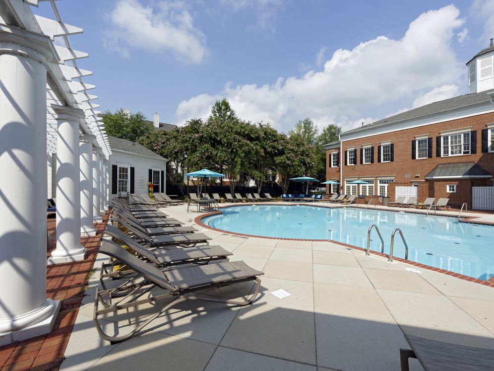 Swimming pool and sundeck with lounge seating