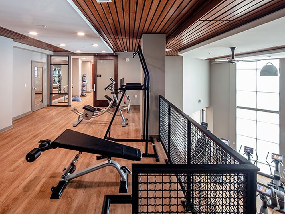 Fitness center upper level with strength equipment
