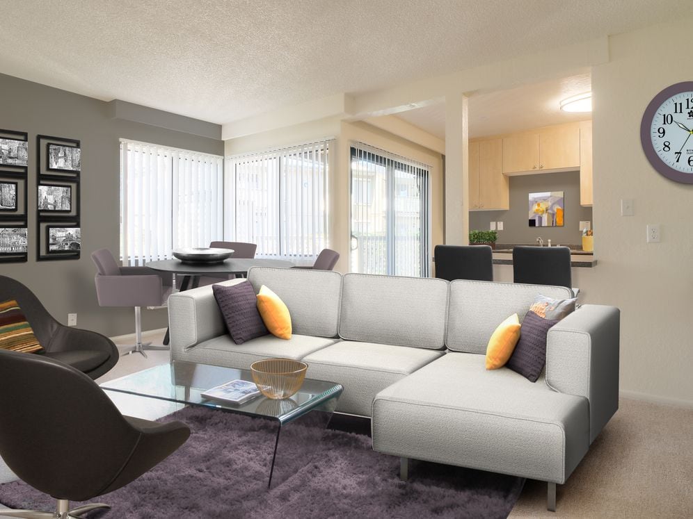 Kitchen, living, and dining area with carpet