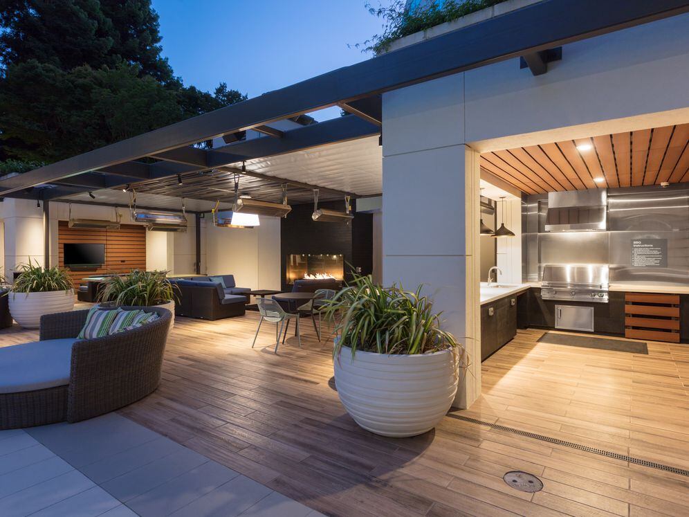 Outdoor Lounge with Kitchenette Seating and Fireplace