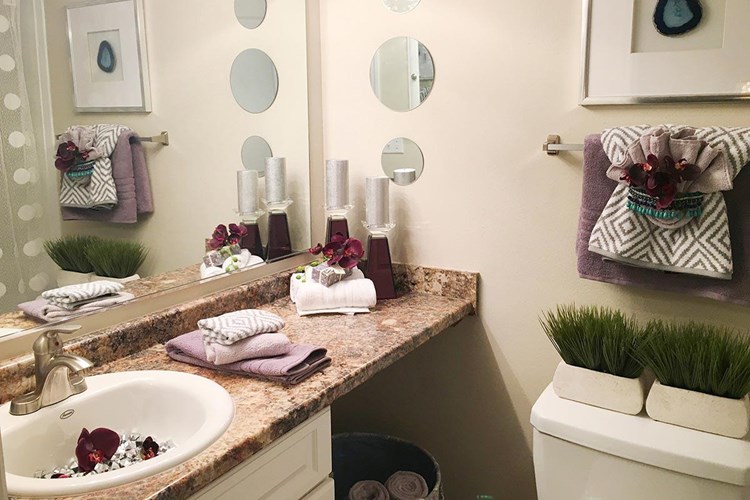 Newly remodeled primary bathroom with large vanity.