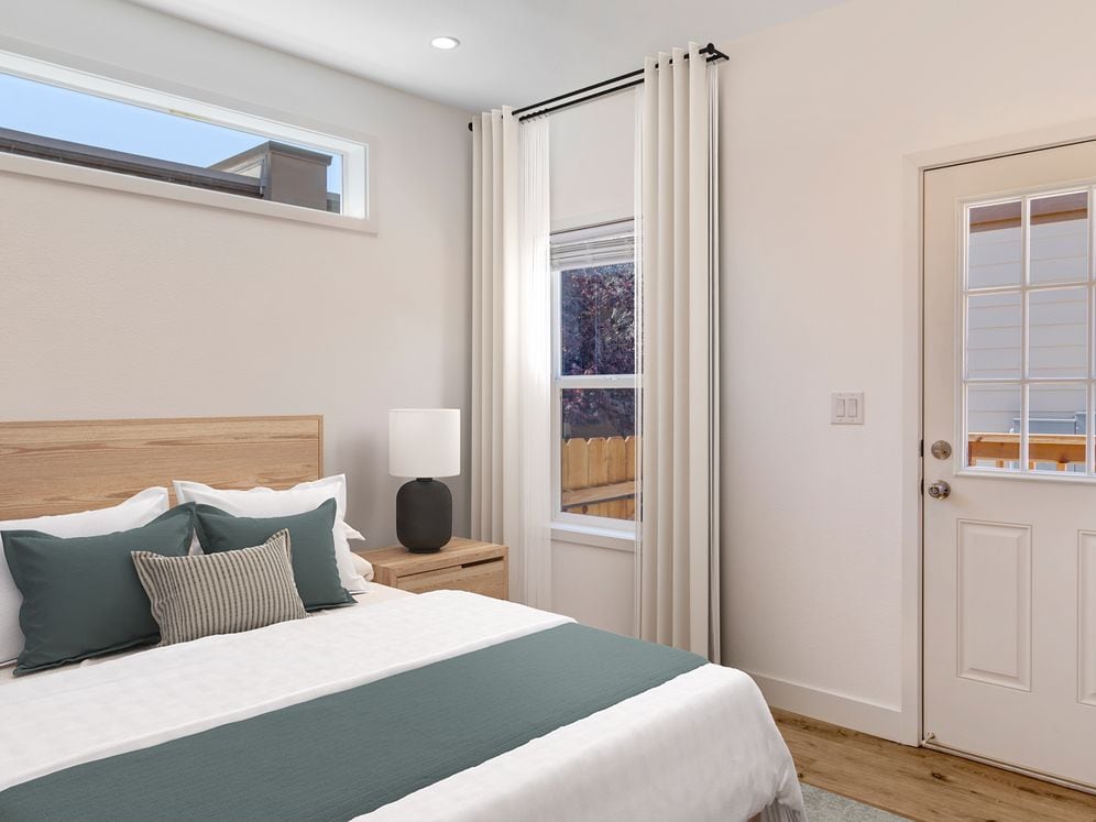 Freestanding Home bedroom with hard surface flooring